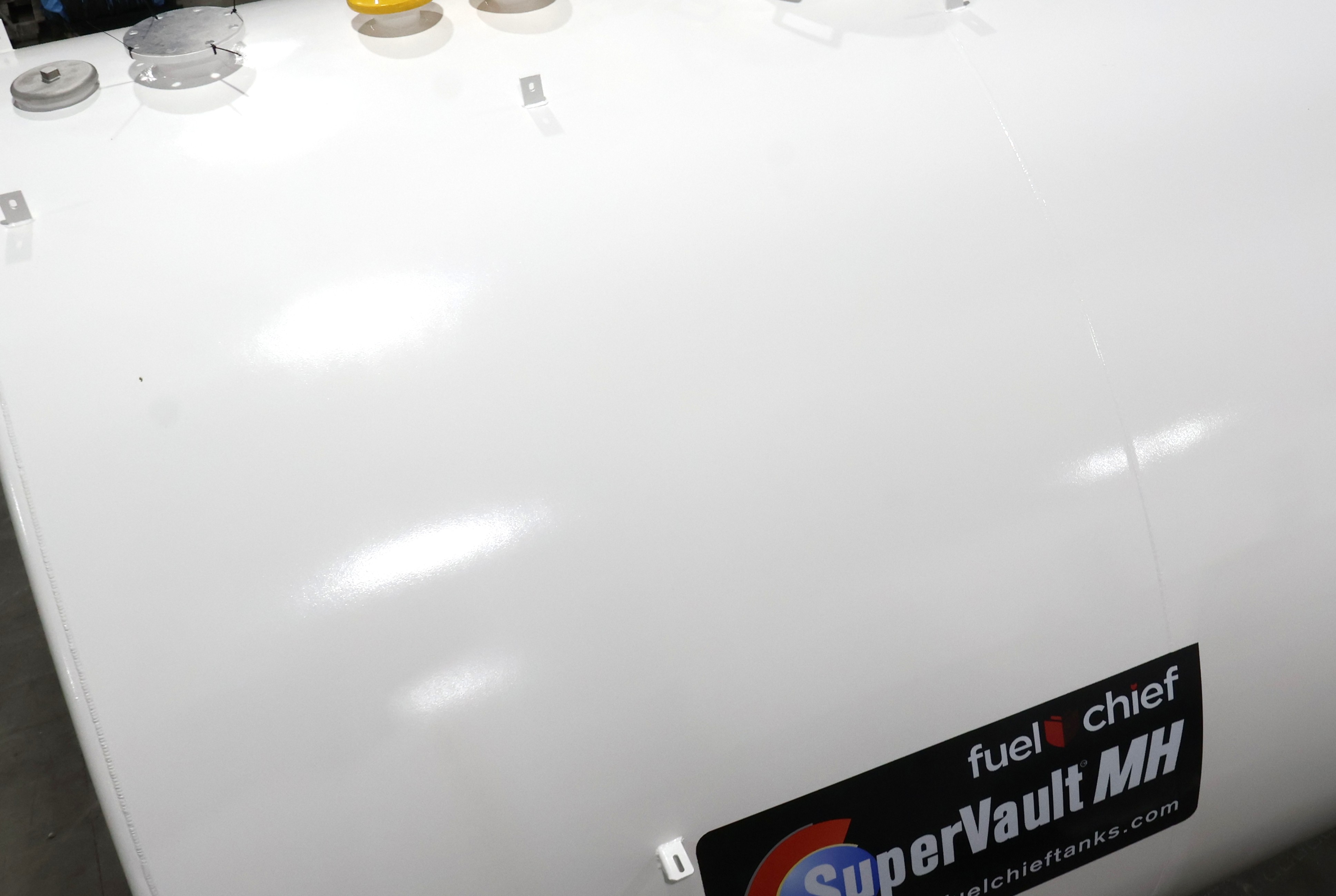 Close view of a white SuperVault MH tank shell