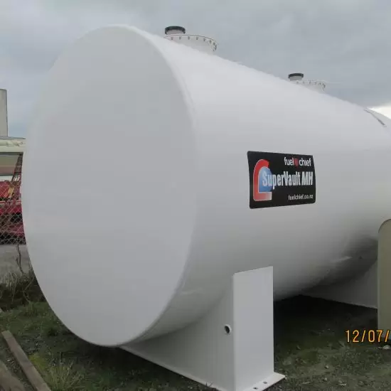 White SuperVault MH tank on concrete supports outdoors