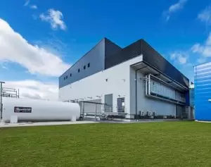 White tank beside a new data centre building