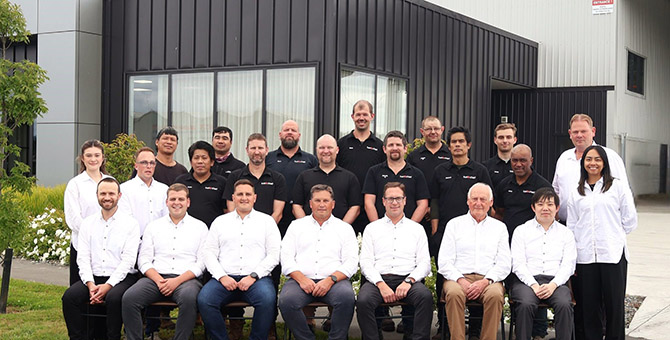 The Fuelchief team in two rows in front of their building